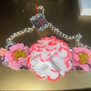 Statement necklace.  Pink/black lace with white/pink flower glitter